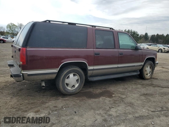 1999 Chevrolet Suburban z VIN 1GNFK16R2XJ328550, wystawiony jako Copart lot #53179525 z przebiegiem 170 914 mil mil oraz Czysty tytuł • Clean title. Historia ofert i sprzedaży dostępna na DreamBid. Obrazek 3.