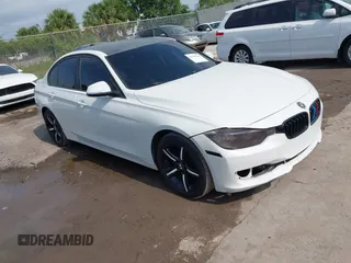 2013 BMW 3 Series 320i with VIN WBA3B1C5XDK129200, listed as a IAAI auction lot 42339344 with 207,208 mi miles and . Bid and sale history available at DreamBid. Image 1.