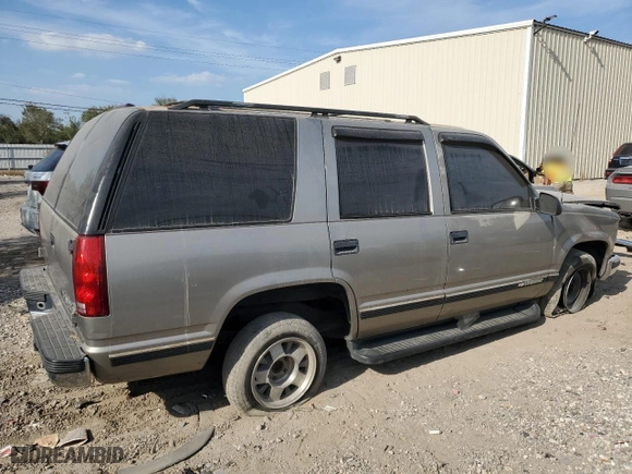 1999 Chevrolet Tahoe with VIN 1GNEC13R6XJ494812, listed as a Copart auction lot 76398254 with 299,584 mi miles and Salvage Title. Bid and sale history available at carsss.com. Image 3.