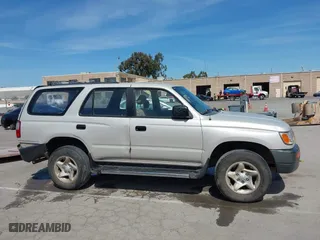 1997 Toyota 4Runner with VIN JT3GM84R6V0019562, listed as a IAAI auction lot 41884580 with 410,874 mi miles. Bid and sale history available at carsss.com. Image 13.