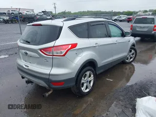 2013 Ford Escape SE with VIN 1FMCU9G94DUC52497, listed as a IAAI auction lot 42352704 with 194,648 mi miles and . Bid and sale history available at DreamBid. Image 4.