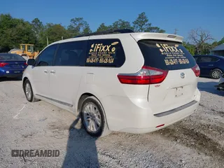 2015 Toyota Sienna XLE with VIN 5TDYK3DC5FS534913, listed as a IAAI auction lot 42052427 with 105,046 mi miles. Bid and sale history available at carsss.com. Image 3.