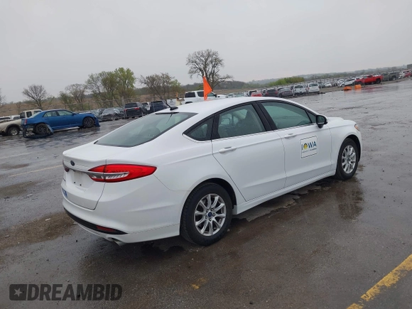 2017 Ford Fusion S with VIN 3FA6P0G72HR337120, listed as a IAAI auction lot 42173384 with 133,320 mi miles and . Bid and sale history available at DreamBid. Image 4.