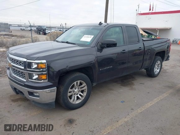 2014 Chevrolet Silverado 1500 LT with VIN 1GCVKREC8EZ325070, listed as a IAAI auction lot 41328199 with 164,009 mi miles and . Bid and sale history available at DreamBid. Image 2.