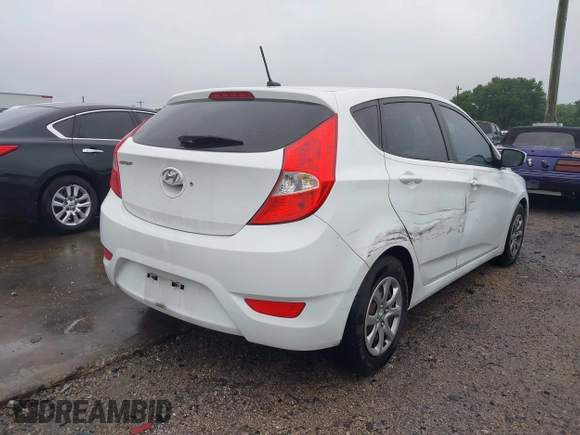 2014 Hyundai Accent GS with VIN KMHCT5AE2EU192769, listed as a IAAI auction lot 42189835 with 135,623 mi miles and . Bid and sale history available at DreamBid. Image 4.