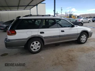 1997 Subaru Legacy Outback with VIN 4S3BG685XV6602836, listed as a Copart auction lot 47376925 with 236,913 mi miles and Salvage title. Bid and sale history available at DreamBid. Image 3.