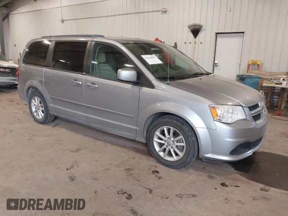 2014 Dodge Grand Caravan SXT with VIN 2C4RDGCG9ER213426, listed as a IAAI auction lot 41044553 with 175,140 mi miles and . Bid and sale history available at DreamBid. Image 1.