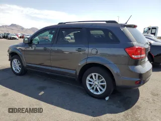 2017 Dodge Journey SXT with VIN 3C4PDCBB5HT701487, listed as a Copart auction lot 58821045 with 118,585 mi miles and Salvage title. Bid and sale history available at DreamBid. Image 2.