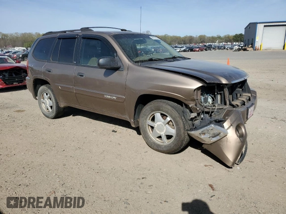 2003 GMC Envoy SLT z VIN 1GKDS13S032134647, wystawiony jako Copart lot #50137325 z przebiegiem 217 878 mil mil oraz Szkody całkowita. Historia ofert i sprzedaży dostępna na DreamBid. Obrazek 4.