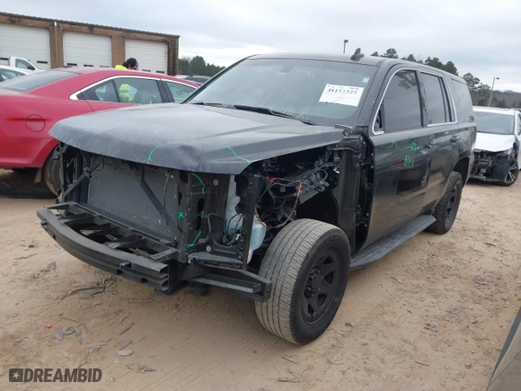 2018 Chevrolet Tahoe Commercial with VIN 1GNLCDEC3JR221708, listed as a IAAI auction lot 41157325 with 163,845 mi miles. Bid and sale history available at carsss.com. Image 2.