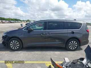 2023 Chrysler Pacifica Hybrid Touring L with VIN 2C4RC1L74PR579782, listed as a IAAI auction lot 42487390 with Not provided miles and . Bid and sale history available at DreamBid. Image 15.