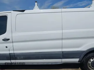 2015 Ford Transit with VIN 1FTNE2YM7FKB00894, listed as a IAAI auction lot 42088996 with 199,321 mi miles and . Bid and sale history available at DreamBid. Image 14.