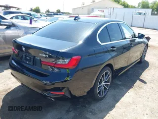 2019 BMW 3 Series 330i with VIN WBA5R1C50KAJ98579, listed as a IAAI auction lot 42359728 with 41,173 mi miles and . Bid and sale history available at DreamBid. Image 4.
