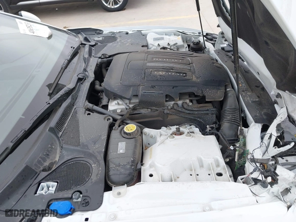 2014 Jaguar XK with VIN SAJWA4EC9EMB52042, listed as a IAAI auction lot 41635233 with 10,566 mi miles. Bid and sale history available at carsss.com. Image 18.