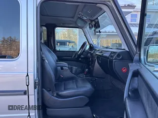 2003 Mercedes-Benz G-Class with VIN WDCYR49E23X141382, listed as a IAAI auction lot 41654677 with 329,762 mi miles. Bid and sale history available at carsss.com. Image 5.