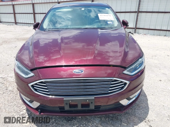 2018 Ford Fusion Titanium with VIN 3FA6P0K92JR114283, listed as a IAAI auction lot 42704476 with 92,502 mi miles and . Bid and sale history available at DreamBid. Image 12.