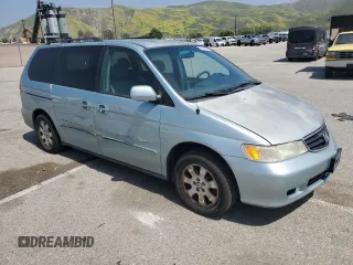 2004 Honda Odyssey EX z VIN 5FNRL18604B080100, wystawiony jako Copart lot #53924755 z przebiegiem 240 913 mil mil oraz Szkoda całkowita • Salvage title. Historia ofert i sprzedaży dostępna na DreamBid. Obrazek 4.