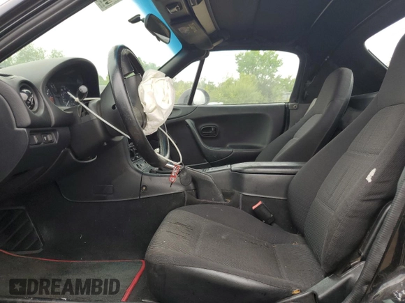 1999 Mazda MX-5 Miata with VIN JM1NB3531X0102616, listed as a Copart auction lot 59779415 with 194,494 mi miles and Salvage title. Bid and sale history available at DreamBid. Image 7.