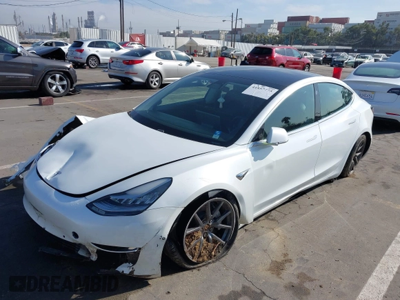 2019 Tesla Model 3 Long Range with VIN 5YJ3E1EB1KF510912, listed as a IAAI auction lot 41857775 with Not Provided miles and . Bid and sale history available at DreamBid. Image 2.