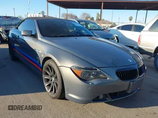 2006 BMW 6 Series 650Ci z VIN WBAEK13416CN77872, wystawiony jako IAAI lot #41648498 z przebiegiem 142 598 mil mil oraz . Historia ofert i sprzedaży dostępna na DreamBid. Obrazek 1.