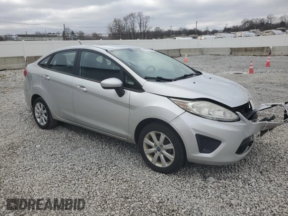 2012 Ford Fiesta SE with VIN 3FADP4BJ5CM170288, listed as a Copart auction lot 49471605 with 104,851 mi miles and Salvage Title. Bid and sale history available at DreamBid. Image 4.