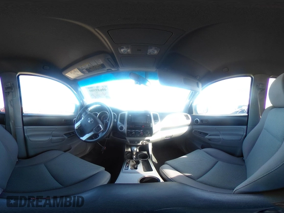 2015 Toyota Tacoma with VIN 3TMLU4EN2FM169326, listed as a IAAI auction lot 40689500 with 77,003 mi miles and . Bid and sale history available at DreamBid. Image 18.