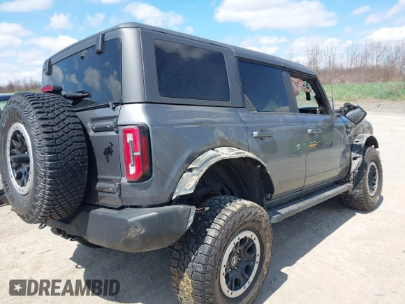 2022 Ford Bronco with VIN 1FMEE5DP3NLB03118, listed as a IAAI auction lot 42096181 with 62,685 mi miles and . Bid and sale history available at DreamBid. Image 4.