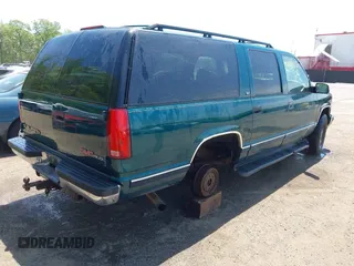 1997 GMC Suburban with VIN 3GKFK16R5VG508908, listed as a IAAI auction lot 42103068 with 264,446 mi miles and . Bid and sale history available at DreamBid. Image 4.