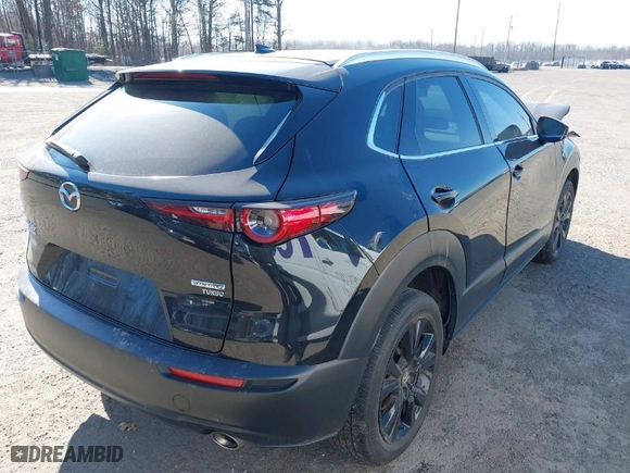 2022 Mazda CX-30 2.5 Turbo Premium Package with VIN 3MVDMBDY0NM459310, listed as a IAAI auction lot 41614937 with 32,514 mi miles. Bid and sale history available at carsss.com. Image 4.