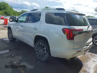 2020 GMC Acadia Denali with VIN 1GKKNXLSXLZ127603, listed as a IAAI auction lot 42313315 with 150,672 mi miles and . Bid and sale history available at DreamBid. Image 3.