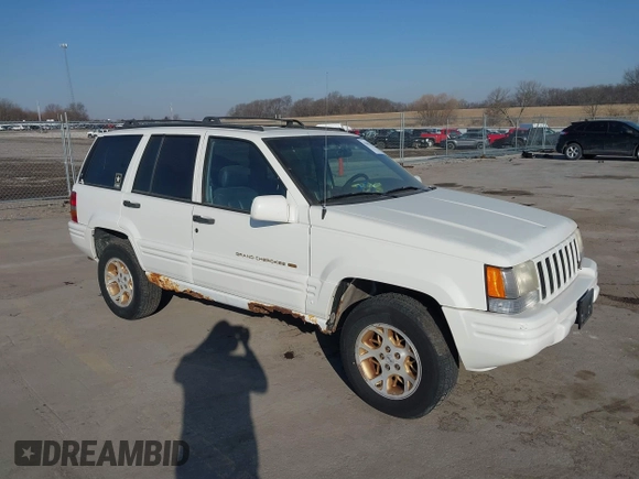 1997 Jeep Grand Cherokee Limited with VIN 1J4GZ78Y8VC769675, listed as a IAAI auction lot 41694347 with 113,834 mi miles. Bid and sale history available at carsss.com. Image 1.