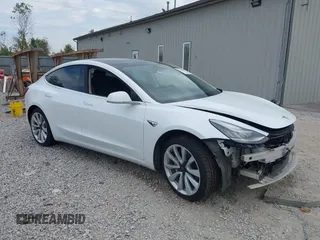 2019 Tesla Model 3 Mid Range z VIN 5YJ3E1EA5KF466517, wystawiony jako IAAI lot #40296116 z przebiegiem 66 509 mil mil oraz . Historia ofert i sprzedaży dostępna na DreamBid. Obrazek 1.