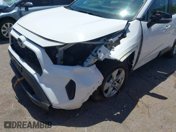 2019 Toyota RAV4 Hybrid LE with VIN 2T3MWRFV2KW026931, listed as a IAAI auction lot 42667582 with 93,147 mi miles and . Bid and sale history available at DreamBid. Image 6.