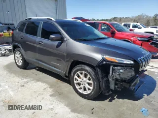 2014 Jeep Cherokee Latitude with VIN 1C4PJLCB7EW313870, listed as a Copart auction lot 48349105 with 217,624 mi miles and Salvage Title. Bid and sale history available at carsss.com. Image 4.