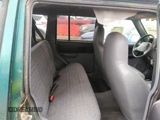 1997 Jeep Cherokee Sport with VIN 1J4FJ68S8VL500942, listed as a IAAI auction lot 40810846 with 224,782 mi miles. Bid and sale history available at carsss.com. Image 8.