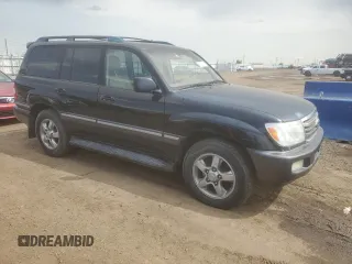 2006 Toyota Land Cruiser z VIN JTEHT05J262085007, wystawiony jako Copart lot #59312615 z przebiegiem 311 264 mil mil oraz Czysty tytuł • Clean title. Historia ofert i sprzedaży dostępna na DreamBid. Obrazek 4.