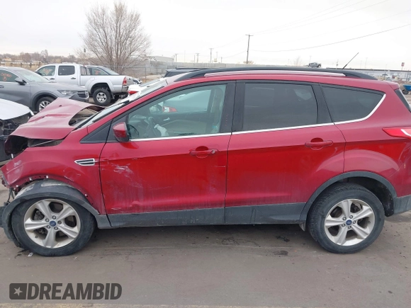 2014 Ford Escape SE z VIN 1FMCU9G93EUC21873, wystawiony jako IAAI lot #41401305 z przebiegiem 222 142 mil mil oraz . Historia ofert i sprzedaży dostępna na DreamBid. Obrazek 13.