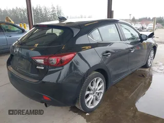2014 Mazda 3 S Grand Touring with VIN JM1BM1M31E1150126, listed as a IAAI auction lot 41813519 with 103,578 mi miles and . Bid and sale history available at DreamBid. Image 4.