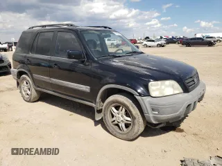 2000 Honda CR-V EX with VIN JHLRD1868YS018131, listed as a Copart auction lot 70475584 with 162,160 mi miles and Salvage Title. Bid and sale history available at carsss.com. Image 4.