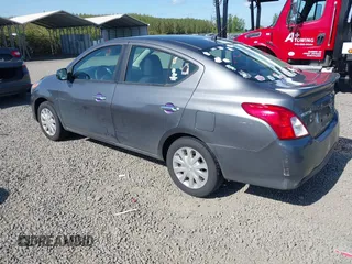 2016 Nissan Versa SV with VIN 3N1CN7AP9GL819060, listed as a IAAI auction lot 42073036 with 143,186 mi miles. Bid and sale history available at carsss.com. Image 3.