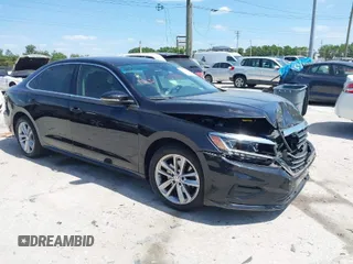 2020 Volkswagen Passat 2.0T SE with VIN 1VWSA7A38LC016969, listed as a IAAI auction lot 41909982 with 88,329 mi miles. Bid and sale history available at carsss.com. Image 1.