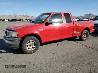 1999 Ford F-150 with VIN 1FTRX07W2XKC24186, listed as a Copart auction lot 74553294 with Not provided miles and Salvage title. Bid and sale history available at DreamBid. Image 1.