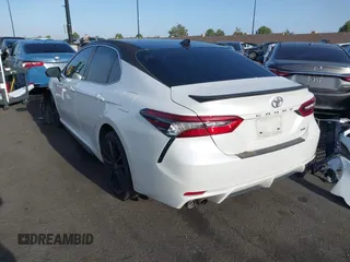 2021 Toyota Camry XSE z VIN 4T1K61AK1MU585677, wystawiony jako IAAI lot #42238920 z przebiegiem 90 089 mil mil oraz . Historia ofert i sprzedaży dostępna na DreamBid. Obrazek 3.