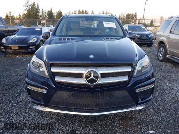 2016 Mercedes-Benz GL with VIN 4JGDF7DE2GA661379, listed as a IAAI auction lot 41059705 with 60,558 mi miles. Bid and sale history available at carsss.com. Image 12.