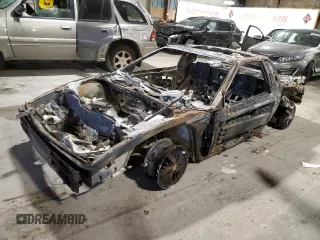 1986 Pontiac Fiero z VIN 1G2PE37R7GP274467, wystawiony jako Copart lot #44980195 z przebiegiem Nie podano mil oraz Szkody całkowita. Historia ofert i sprzedaży dostępna na DreamBid. Obrazek 1.