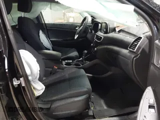 2019 Hyundai Tucson Sport z VIN KM8J33AL6KU938288, wystawiony jako IAAI lot #41849657 z przebiegiem 32 307 mil mil oraz . Historia ofert i sprzedaży dostępna na DreamBid. Obrazek 5.