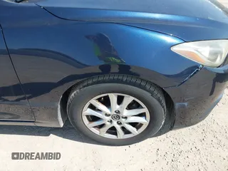 2014 Mazda 3 i Touring with VIN JM1BM1V71E1140598, listed as a IAAI auction lot 42030782 with 138,842 mi miles and . Bid and sale history available at DreamBid. Image 6.