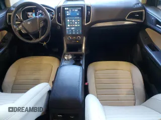 2021 Ford Edge SE with VIN 2FMPK4G96MBA23884, listed as a Copart auction lot 45997735 with 129,558 mi miles and Salvage title. Bid and sale history available at DreamBid. Image 8.