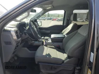 2023 Ford F-150 Lightning Pro with VIN 1FT6W1EV0PWG34788, listed as a Copart auction lot 54454805 with 11,432 mi miles and Salvage title. Bid and sale history available at DreamBid. Image 7.