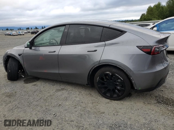 2024 Tesla Model Y Long Range with VIN 7SAYGDEE1RF159332, listed as a Copart auction lot 61179495 with 9,259 mi miles and Salvage title. Bid and sale history available at DreamBid. Image 2.